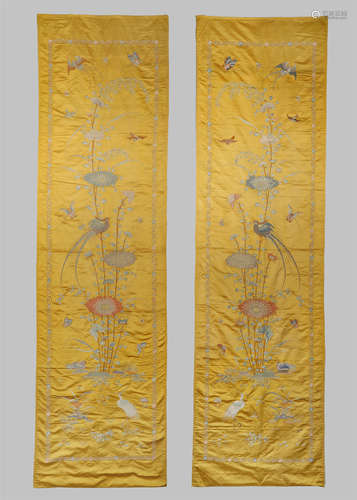 A PAIR OF CHINESE YELLOW SILK PANELS