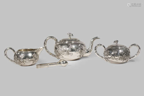 A  CHINESE SILVER THREE-PIECE TEA SET