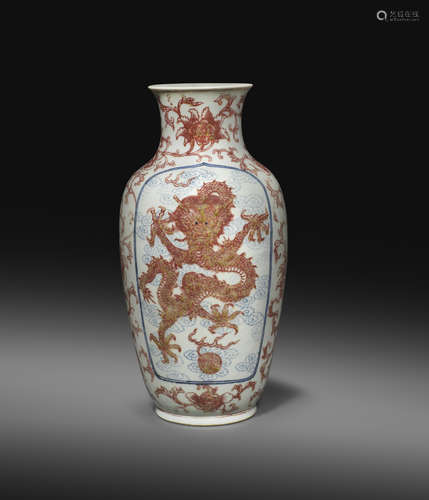 A RARE CHINESE COPPER-RED AND UNDERGLZE BLUE 'DRAGON AND PHOENIX' VASE