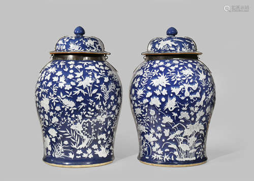 A LARGE PAIR OF CHINESE BLUE-GROUND VASES AND COVERS