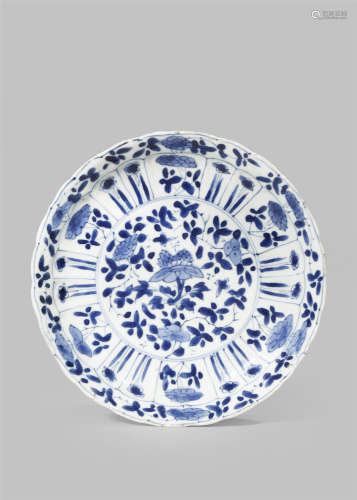 A CHINESE BLUE AND WHITE MOULDED DISH