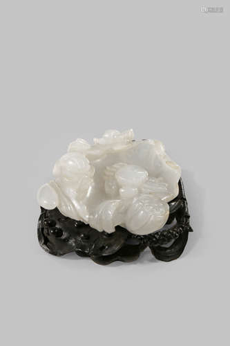 A CHINESE WHITE JADE 'LOTUS' BRUSH WASHER