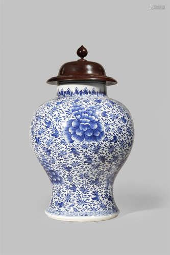 A CHINESE BLUE AND WHITE BALUSTER VASE