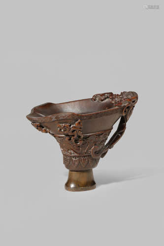 A CHINESE RHINOCEROS HORN 'DRAGON' LIBATION CUP