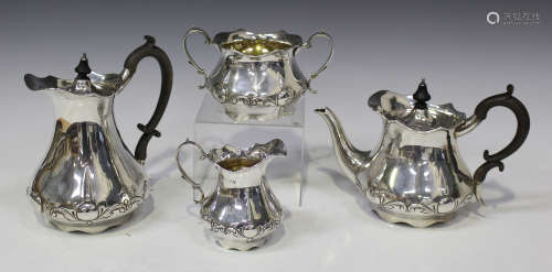 An Edwardian silver four-piece tea set of low-bellied form, each decorated with an acanthus scroll