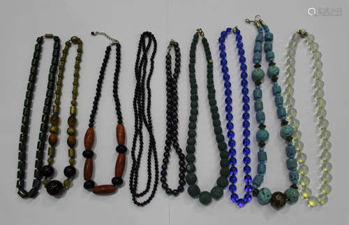 Thirty bead necklaces, including glass and minerals.Buyer’s Premium 29.4% (including VAT @ 20%) of