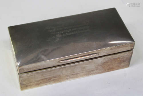 A George V silver rectangular cigarette box, London 1923, length 19cm.Buyer’s Premium 29.4% (