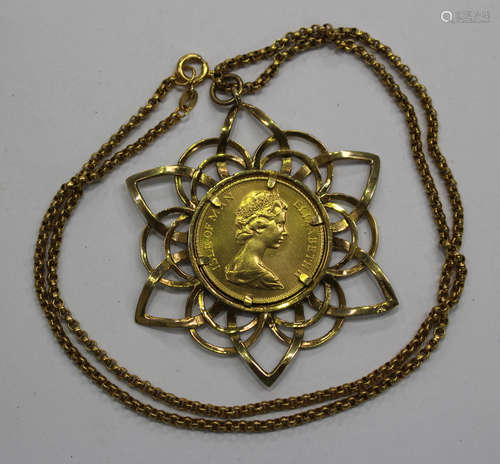 An Elizabeth II Isle of Man sovereign 1973, in a 9ct gold pendant mount, length 5cm, on a 9ct gold