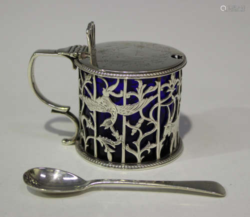 A Victorian silver cylindrical mustard with engraved hinged tappit lid, above pierced sides