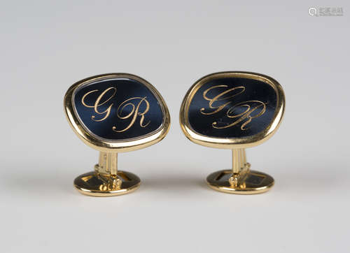 A pair of Patek Philippe Genève gentleman's gold cufflinks, the curved elliptical fronts