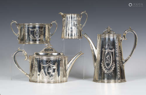 A Victorian silver four-piece tea set of oval serpentine form, engraved with crest filled oval