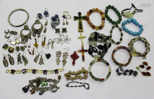 A group of jewellery, comprising twenty-one pairs of earrings, four pendant crosses, fifteen