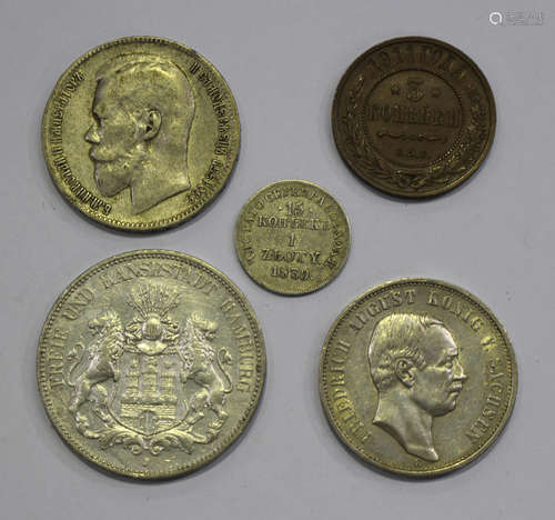 A Russia rouble 1897, a Russia/Poland fifteen kopeks/one zloty 1839, a Russia three kopeks 1911, a