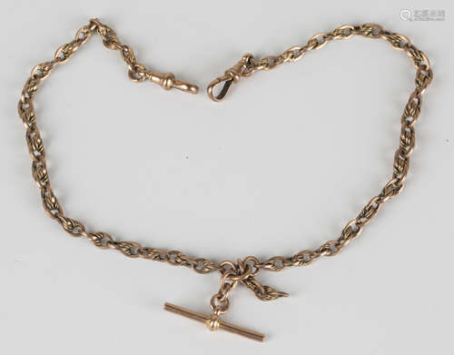 A 9ct gold Albert chain in a fancy oval link design, fitted with a T-bar and two swivels, length