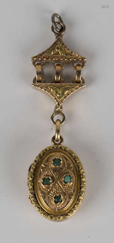 A Victorian gold and turquoise oval pendant locket, fitted to a gold chainwork suspension