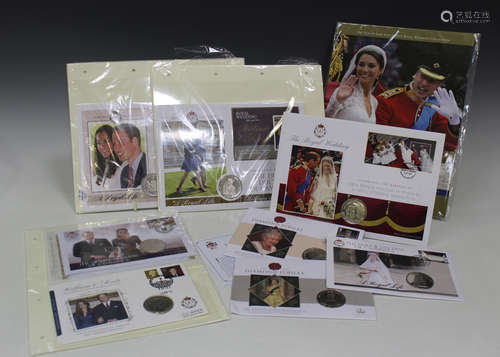 A collection of Elizabeth II commemorative postage covers, mounted with crown-size coins, mostly