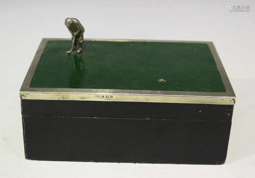 A George V silver mounted rectangular ebonized wood and green stained leather cigarette box, the