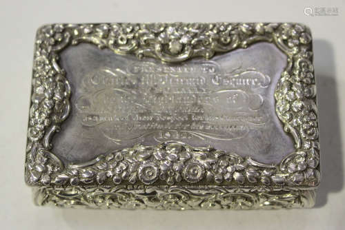 A William IV silver rectangular snuff box, the hinged lid presentation inscribed within a raised