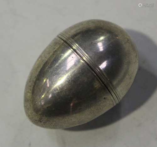A George III silver nutmeg grater of ovoid form, the screw lid revealing a steel grater, maker's