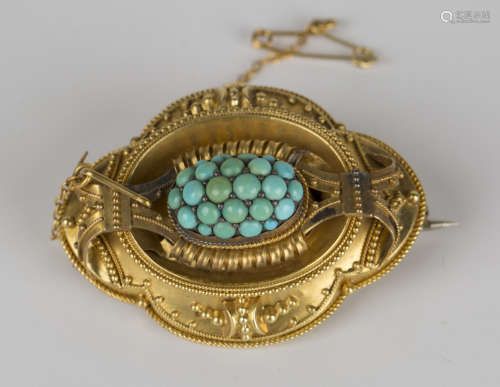 A Victorian turquoise brooch of shaped oval form, pavé set with turquoise to the oval domed