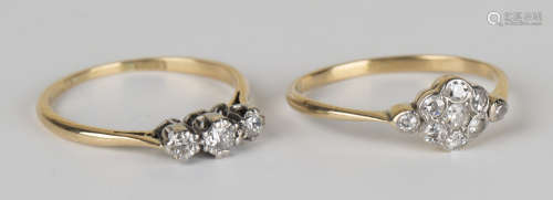 A gold and diamond nine stone cluster ring, mounted with circular cut diamonds, ring size approx