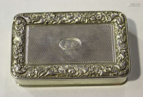 A George III silver rectangular snuff box with overall engine turned decoration, the hinged lid