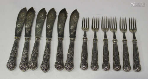A set of six Victorian silver Queen's pattern fish knives with pierced and engraved blades, London