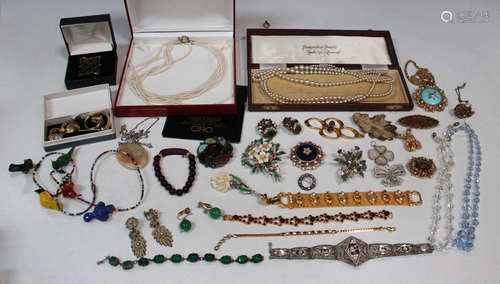 A collection of costume jewellery, including necklaces, brooches and earrings.Buyer’s Premium 29.