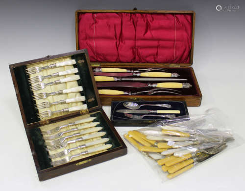 A late Victorian Elkington & Co five-piece carving set, each reeded ivory handle with silver mounts,