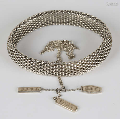 A Tiffany & Co silver bracelet in a woven link design, detailed 'Tiffany & Co 925', inside width 6.