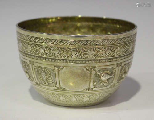 A Victorian silver bowl, decorated in relief with signs of the zodiac between an engraved border,