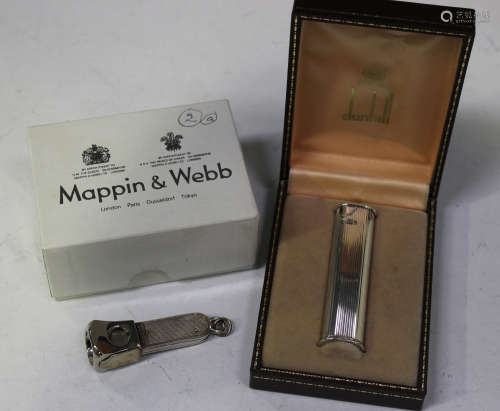 An Elizabeth II silver cigar cutter with engine turned decoration, Birmingham 1983 by Mappin & Webb,