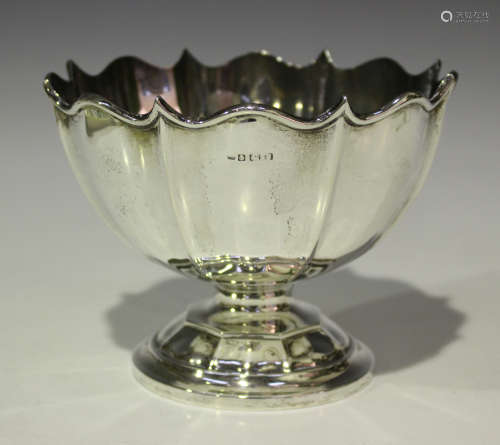 A George V silver rose bowl of lobed form, raised on circular foot, Birmingham 1921 by A & J