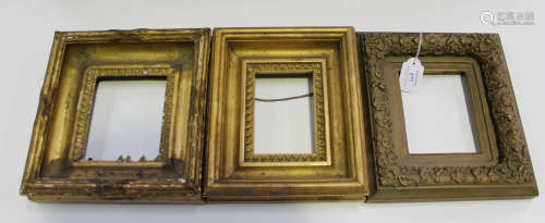 A 19th century gilt composition frame of foliate moulding, rebate size 14cm x 11cm, together with