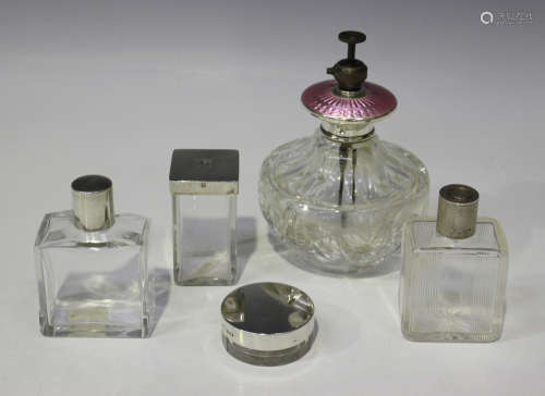 A sterling and pink enamel mounted cut glass atomizer, height 15cm, together with four other