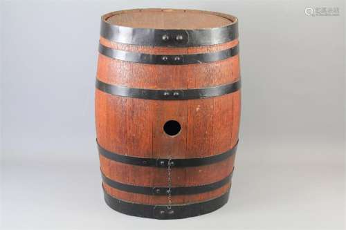 A Large Oak-Aged Wooden Beer Barrel