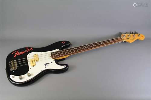 A Fender Precision Bass Guitar