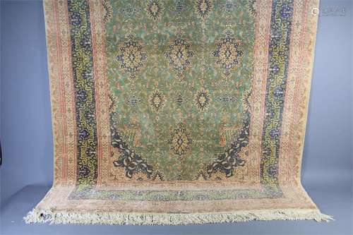 A Persian Silk Carpet