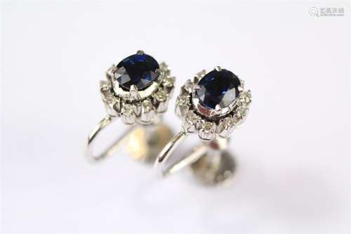 A Pair of White Gold Sapphire and Diamond Earrings