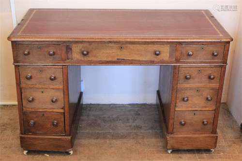 A Victorian Mahogany Pedestal Knee-Hole Desk