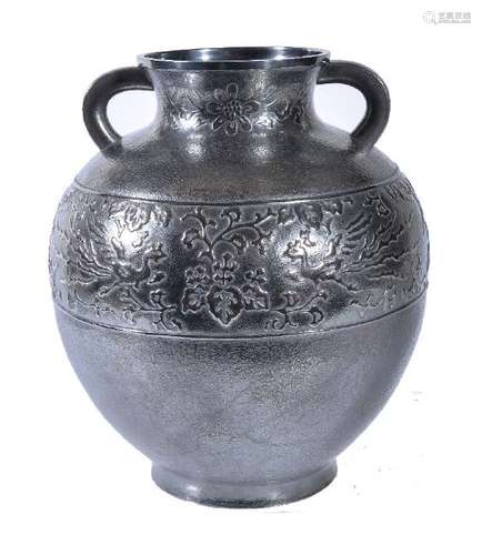 A Japanese White Metal Vase of globular form resting on