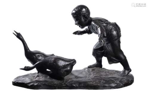 A Large Japanese Bronze Group showing a small boy in a