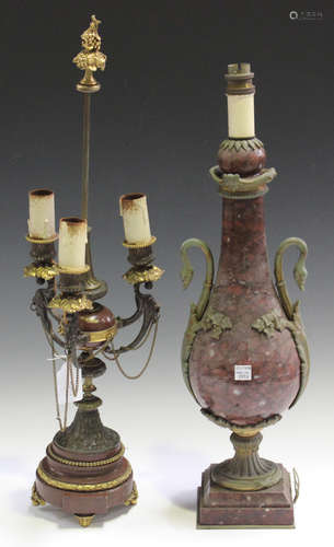 A late 19th century French rouge marble and gilt bronze mounted three light candelabrum, the