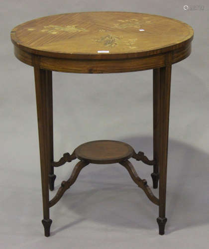 A late Victorian satinwood circular occasional table, the top inlaid with three sprays of lily-of-