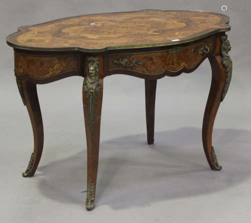 A late 20th century Louis XV style kingwood and foliate inlaid centre table, the shaped oval top