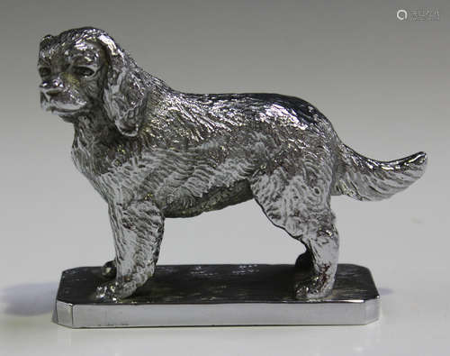 A cast metal chromium plated car mascot in the form of a spaniel, the underside marked 'Lejeune Made