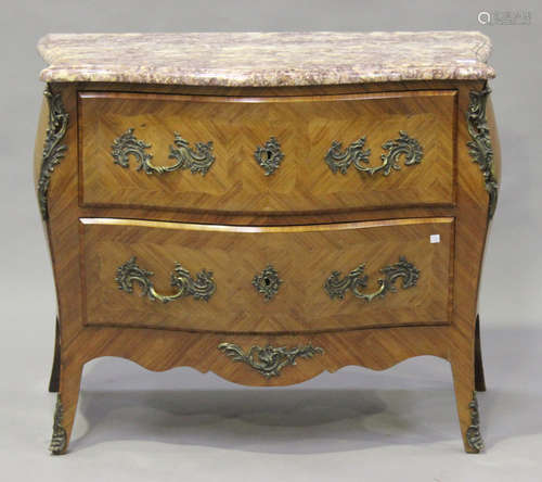 A 20th century French Louis XV style serpentine fronted kingwood commode with gilt metal mounts, the