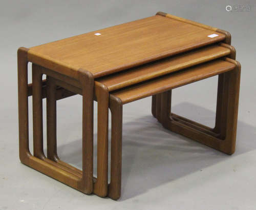 A mid-20th century Danish nest of three teak occasional tables, on angular supports, height 44cm,