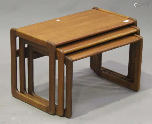 A mid-20th century Danish nest of three teak occasional tables, on angular supports, height 44cm,