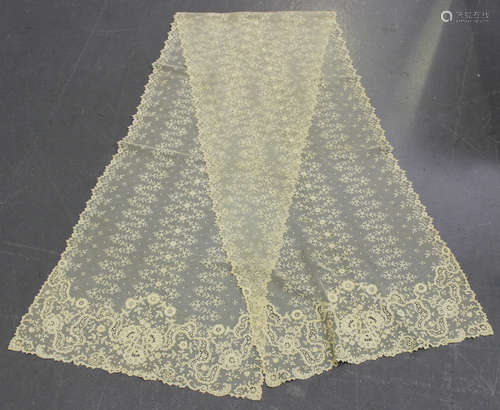 An early 20th century ivory-toned lacework stole, 225cm x 51cm, together with a small group of other